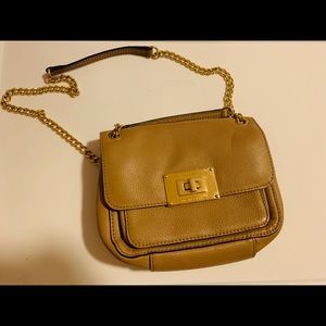 Authentic MK leather purse in BRAND NEW condition.
